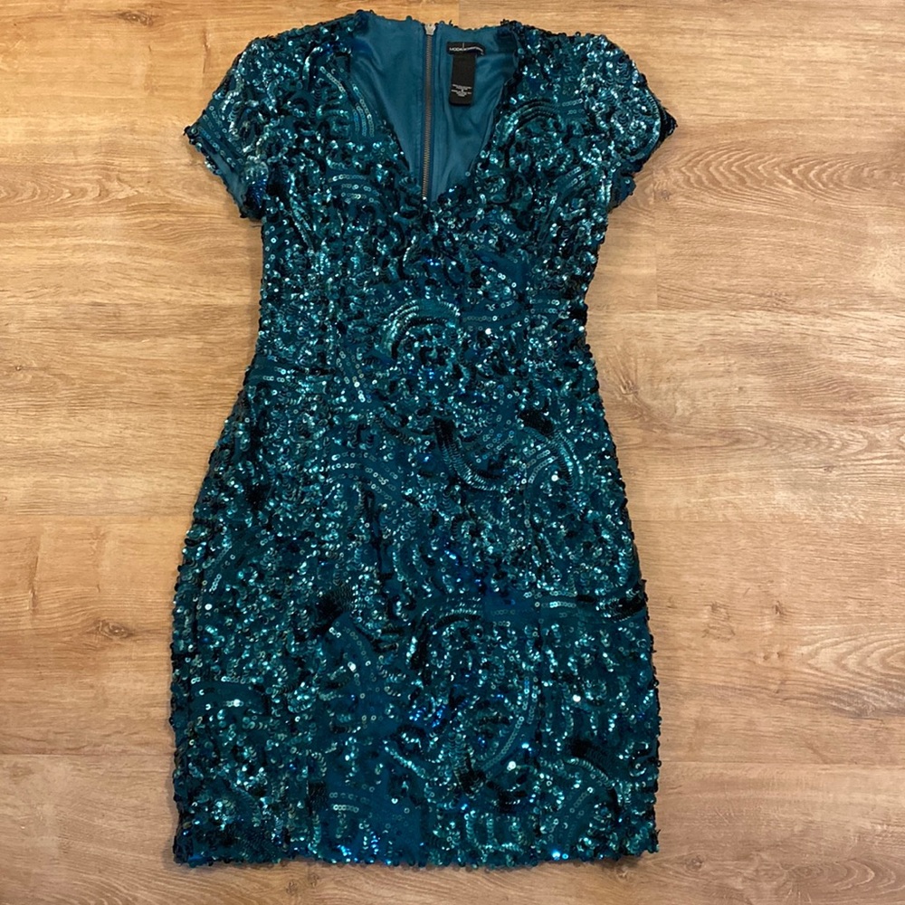 Emerald green sequins dress